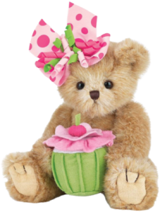 a teddy bear with pink bowl